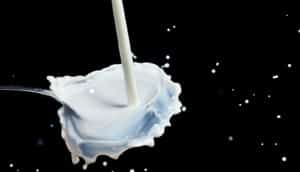 plant-based milk pouring onto spoon
