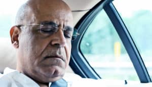 sleeping man in car