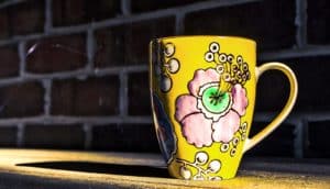 yellow ceramic cup (ceramics concept)