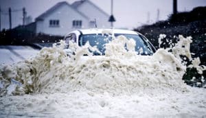 car drives into flood water