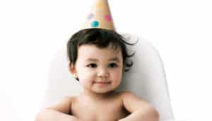 baby in party hat