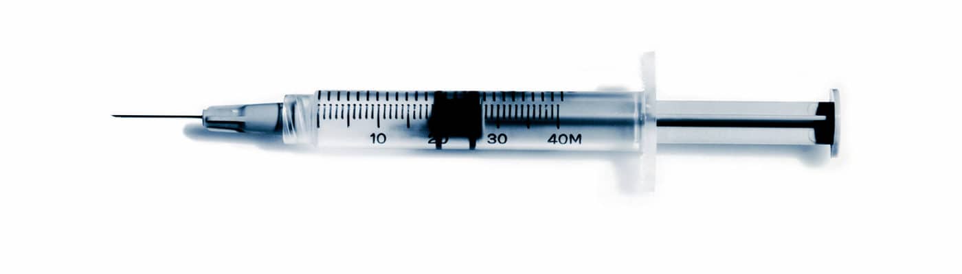 hypodermic syringe (cancer vaccine concept)