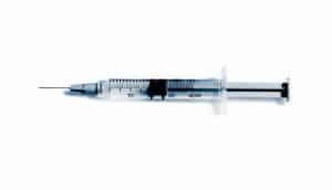 hypodermic syringe (cancer vaccine concept)