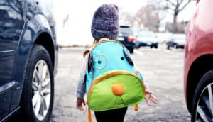kid alone with dog backpack