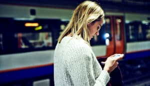 checking news on phone (fake news concept)