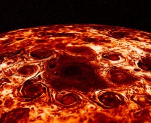 Eight massive storms form an octagon around a storm at the center of Jupiter's north pole.