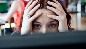 woman shocked using computer