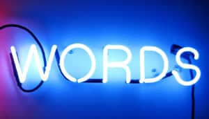 words neon sign (how words evolve)