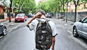 young man walking away (eating disorders concept)