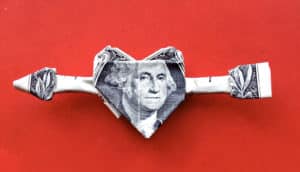 dollar bill heart on red