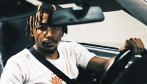 man in driver's seat of car - Uber drivers