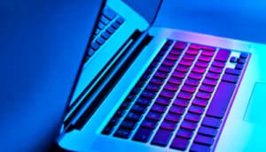 laptop in blue and pink light (blind internet users)