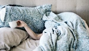 sick in bed (flu concept)