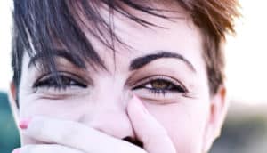 smiling eyes (humor and laughter concept)