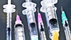 syringes on table (injectable bandage concept)