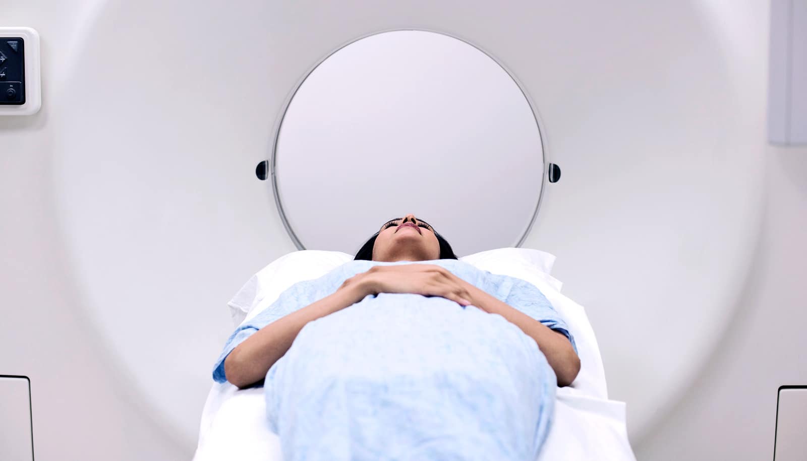 woman in MRI machine (MRI scans concept)