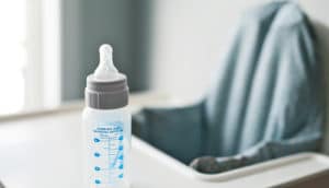 baby bottle on high chair - hereditary fructose intolerance