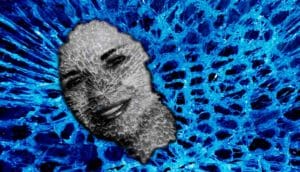 face in blue broken glass - psychosis