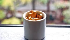 coffee mug ashtray (nicotine concept)