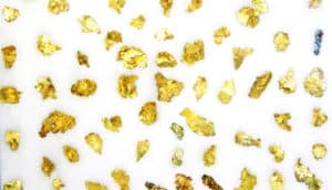 gold flakes on white - nanoporous gold