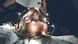 lights on sleeping person (sleep and memory concept)