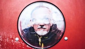 man looking out through window (neurons and brain activity concept)