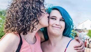 mother and daughter hugging (parents concept)