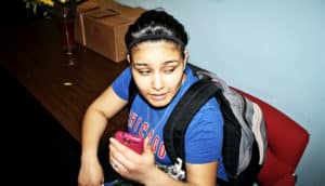 young woman making shifty eyes (cheating concept)