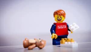 lego figure playing with legos