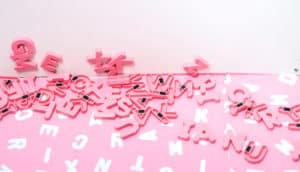 pink magnet letters fall off wall - letters of recommendation