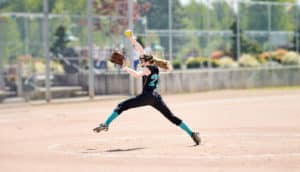 softball pitcher lunging