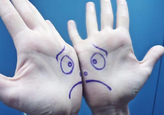 sad face on palms on hands - spanking