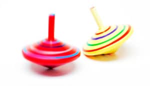 two spinning tops on white - exoplanet spin dynamics