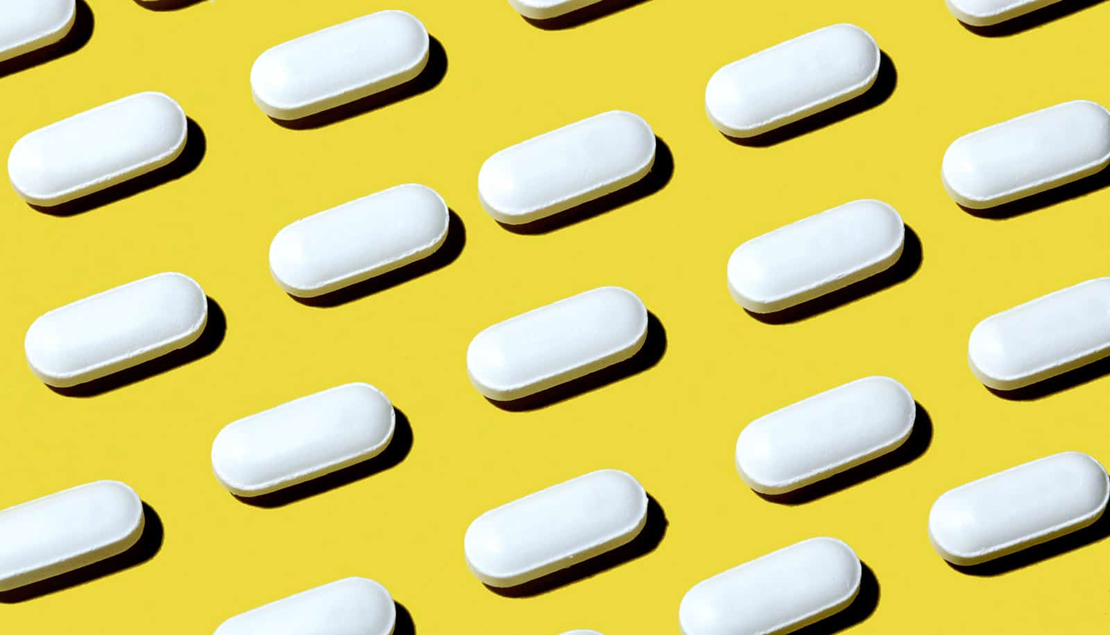Research news from top universities. white pills on yellow (antipsychotics ...