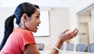 woman explaining (inequity concept)