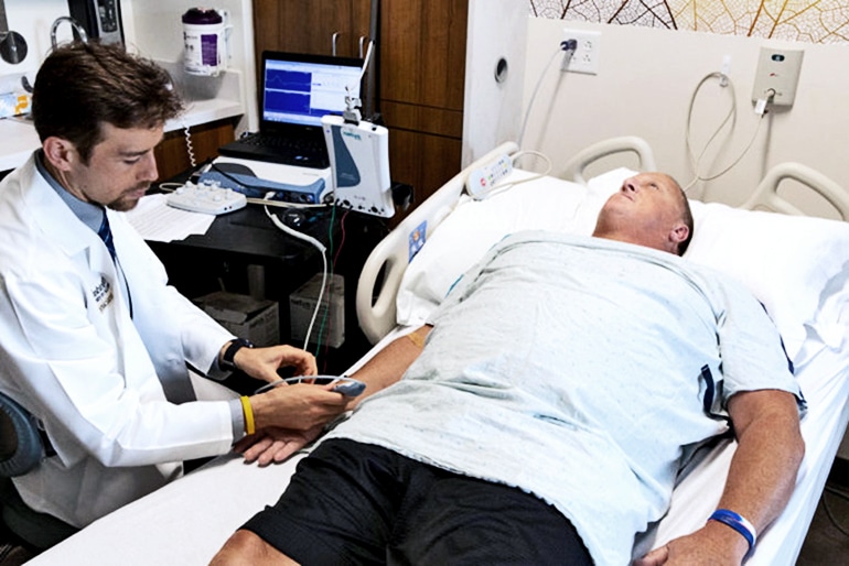 ALS patient Gregory Easter with Robert Bucelli