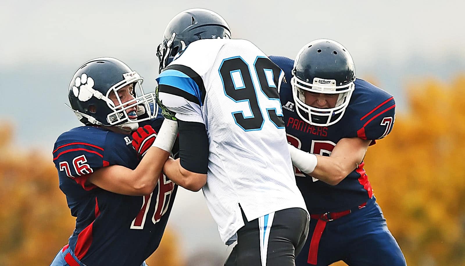 young men playing football - sports war