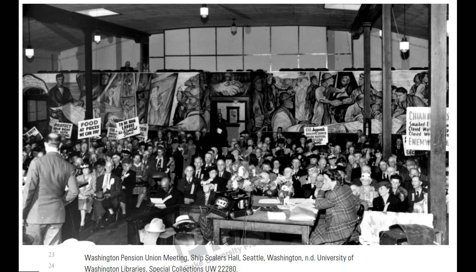 meeting in front of labor mural