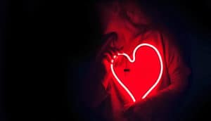 neon heart on black