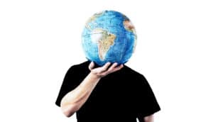 globe in front of face (climate change concept)