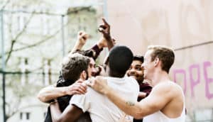 men celebrating win (pride concept)