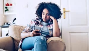 woman using phone (Facebook concept)