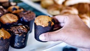 taking muffin (food choices concept)