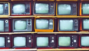 wall of TVs (political advertising concept)