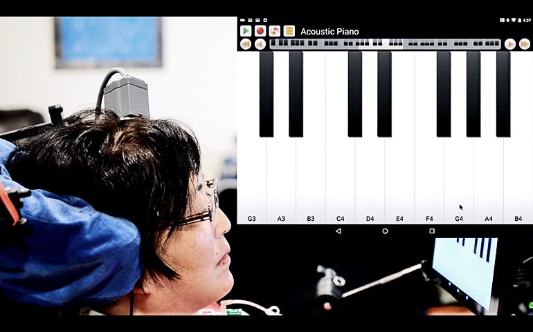 A participant in the BrainGate clinical trial plays "Ode to Joy" on a virtual keyboard interface