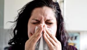 sneezing woman (ragweed concept)