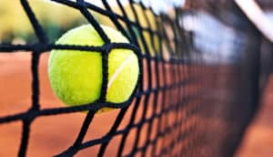 tennis ball hitting net