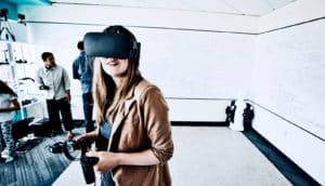 woman wearing virtual reality headset (holodeck concept)