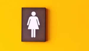 women's bathroom sign (incontinence concept)