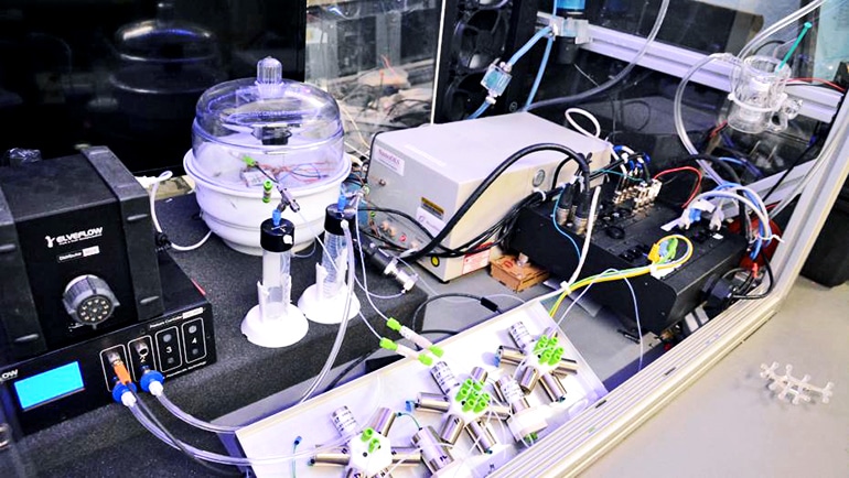 artificially intelligent microreactor, which includes a fluid deliver system, microreactor, IR thermography, and computational hardware.